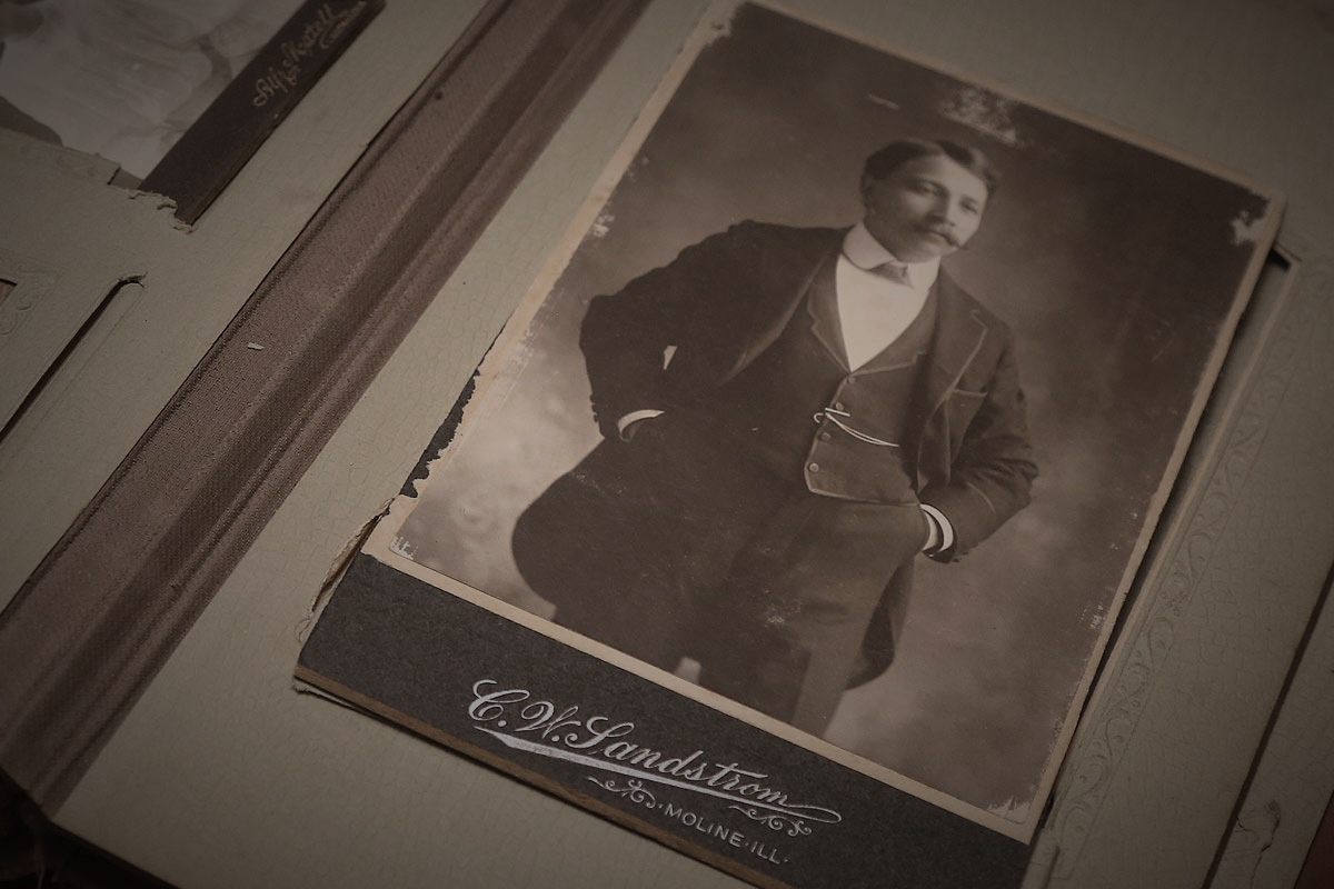 A black and white photo of an old man.